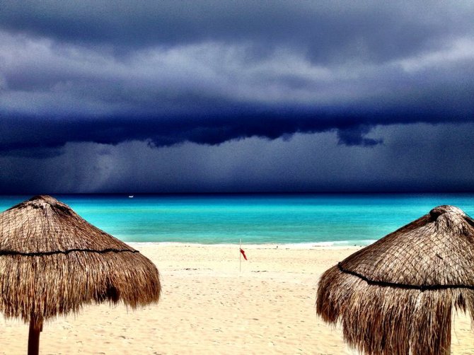 This was taken on our honeymoon in Cancun a tropical storm was brewing and made for breath taking views!!!! 