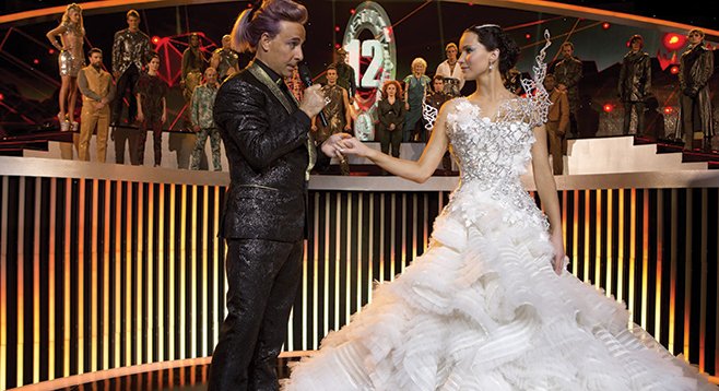 The Hunger Games: Catching Fire — Someone please start a petition for Stanley Tucci to host the Oscars in this suit.