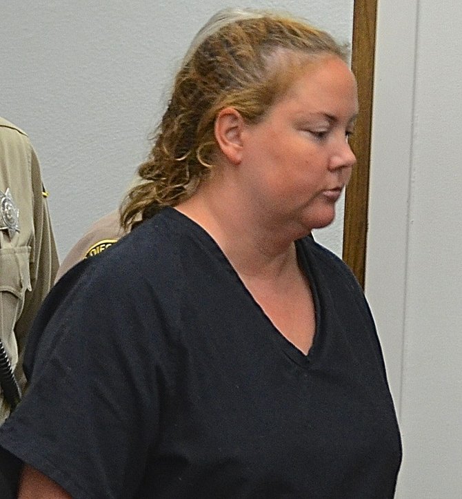 Julie Harper brought into court in August 2012. Photo Weatherston
