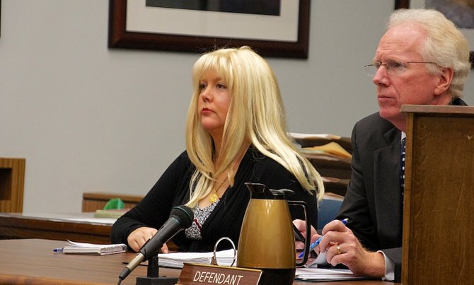 Julie Harper and attorney Paul Pfingst in court Nov 22 2013. Photo by Eva