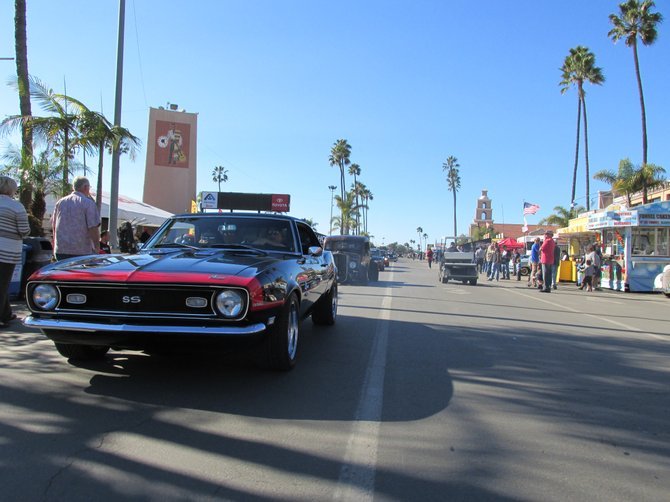 The classic car cruise down the fairground's midway was a highlight of the show.