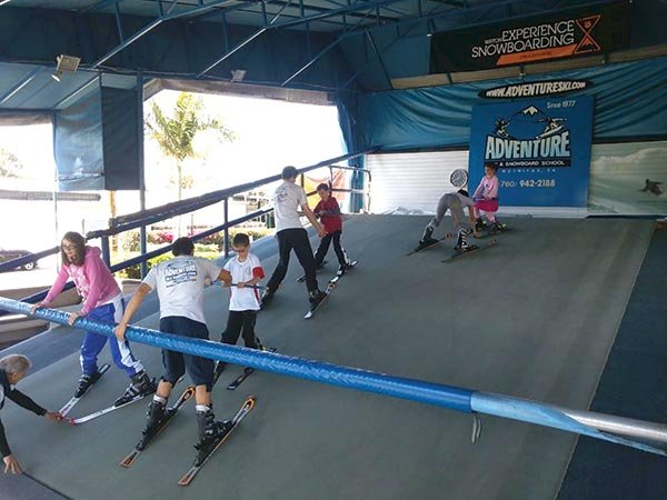 Novices learn to ski in the warmth of coastal North County at Adventure Ski and Snowboard School.
