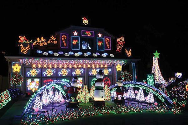 In Tierrasanta, the Schimka family decorates their home using 6500 lights accompanied by homemade decorations.