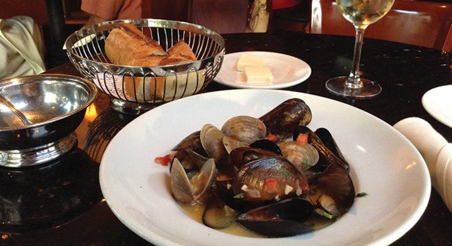 What $11 buys: 50/50 mix of mussels and clams, piece of bread, glass of house white.
