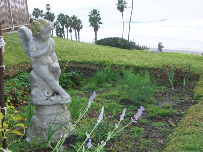 Angel statue in the Beachcomber Motel garden overlooking the ocean in San Clemente.