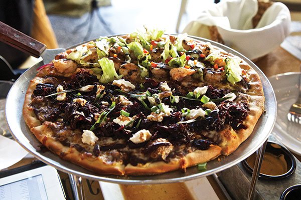 Some restaurants, such as El Colegio, are using pizza as a vehicle for Baja ingredients.