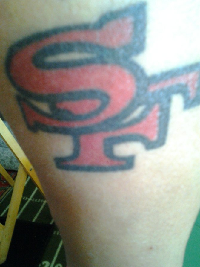 I'm a die hard 9er fan in Charger country
Wanted something different I haven't seen another Female have
I got this Tat while visiting San Francisco.
The person who did this Tat his Father was a 49er in the 60's

AIN'T NOTHING FINER THAN A 49ER!!!!!!