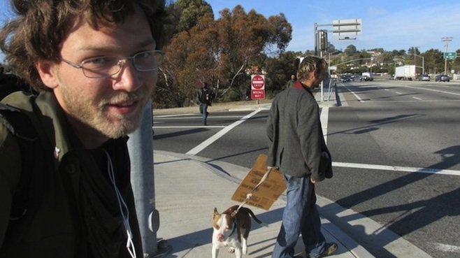 Freeway exit panhandlers Ian and Randall were threatened by the two men across the street.