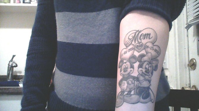 My tattoo is pretty self-explanatory. I go this tattoo about a year ago; reason why? Because i lost the closest person to me, My Mom. She left young and sudden. This tattoo was a way to still feel close to her. She loved mickey mouse, it was her hobby to collect all things mickey. A buddy drew this up some time after my moms passing and i saved up for it. My tattoo due thanks to Lance at Church of Steel Downtown. I'm an unemployed student who lives in golden hills and Loves tattoos.