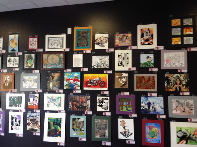 Slides' left wall features art from Helix High students