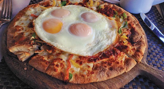 Authentic? No, but Bedford found Osteria Panevino's breakfast pizza to be a tasty bargain.