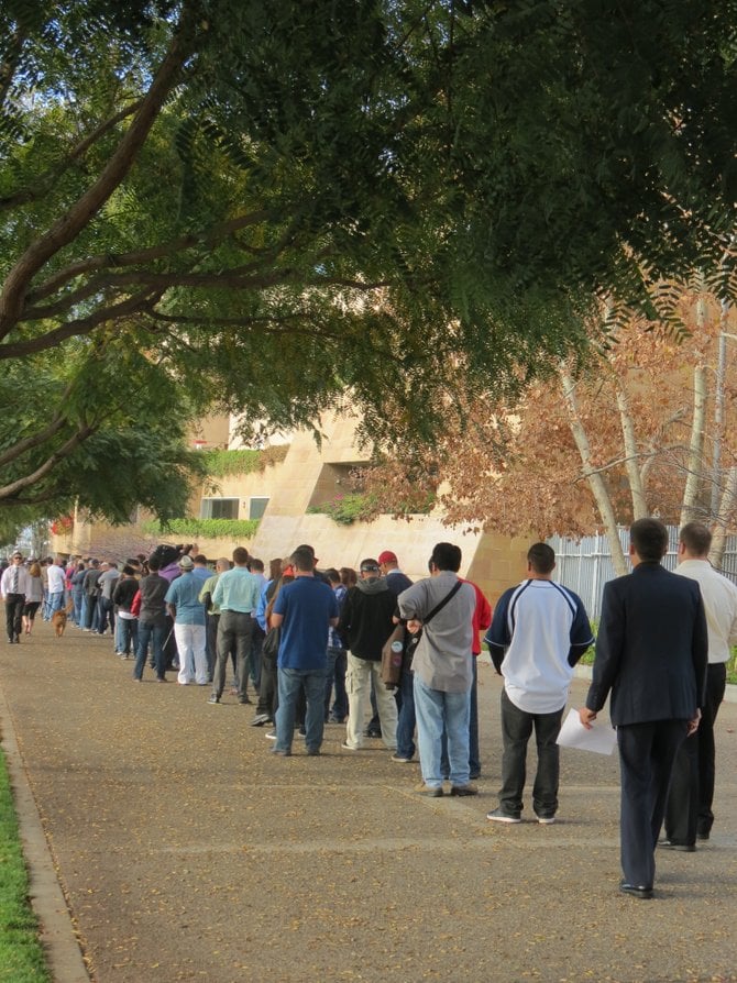 The line of potential PA's in front of Petco Park.