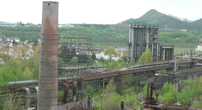 A historic ironworks overlooks the city of Saarbrücken on the French–German border. 