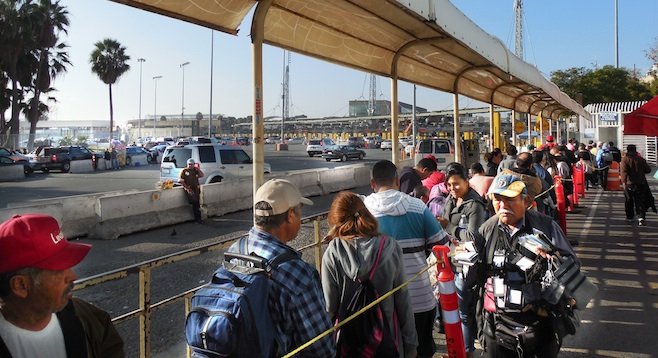 Pedestrian traffic in Mexico waiting to cross the border