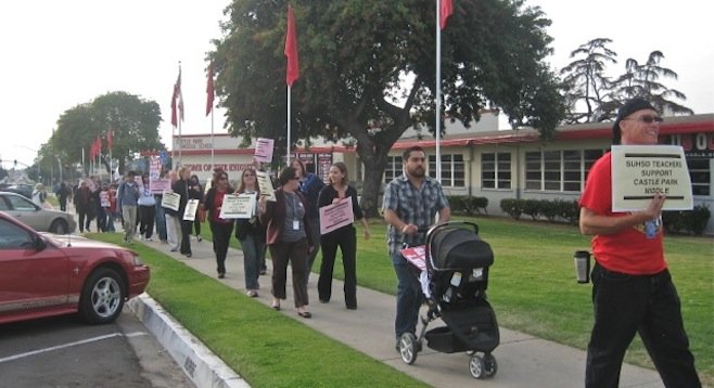 Teachers and supporters protest walk before January 23 meeting
