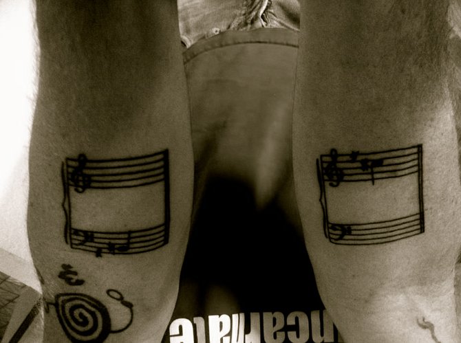 Being a long-time SD musician, I realized it was time at last to get my two favorite piano notes indelibly inked on my arms, where I can see them daily.  They're dual reminders of how I choose to live my life; one represents Awareness (See Sharp): the other, Authenticity (Be Natural). My girlfriend-at-the-time's initials are the grace notes, hovering before them like a nectar-drunk hummingbird, or the blue man in the Chagall.  Pete at Allegory is an exquisite artist, as well as a true gentleman--a thinking man's tattoo guy-- and I recommend him to everyone I know looking to ink.  The old girlfriend, well. That's a tale for another day.  

-JD Boucharde