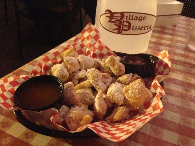 Zeppolis: Fried dough with powdered sugar