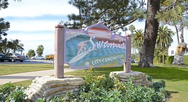 Signage near the parking lot for popular surf spot called Swami's, in Encinitas, California. Photo by Weatherston