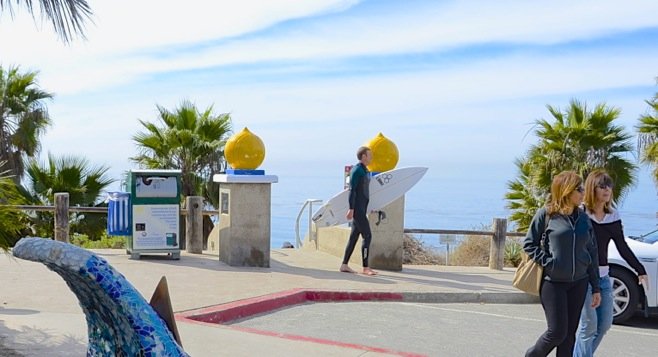 This surfer leaving the popular location known as Swami's is NOT the defendant. Photo Weatherston
