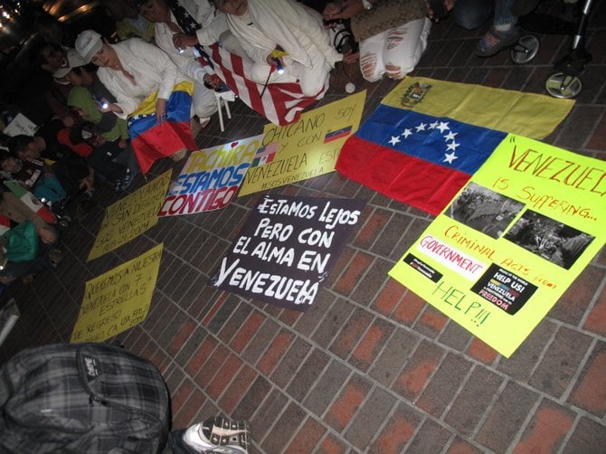 Venezuelan and sympathizers showing their discontent with the venezuelan regime situation. "We are far, but our soul in Venezuela"