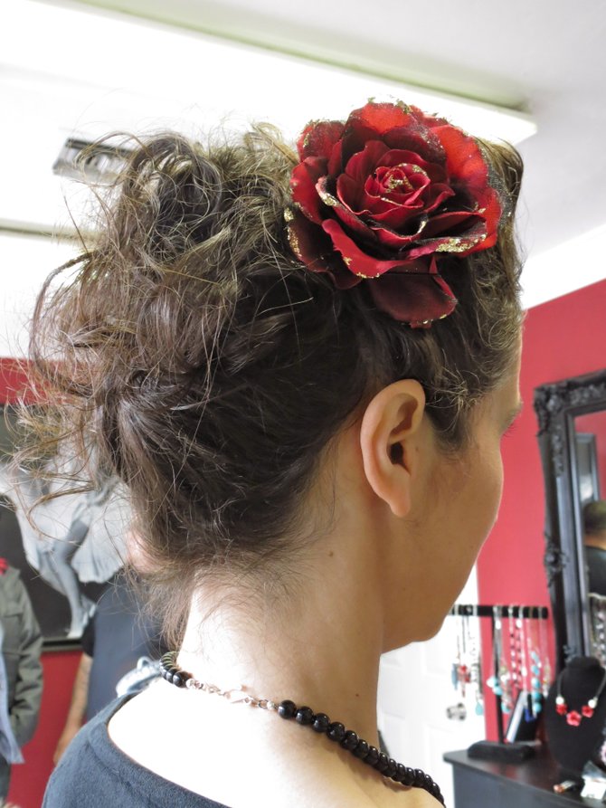 Pin-up inspired hairstyle done by Yajaira Del Rio at Rock N' Beauty Salon.