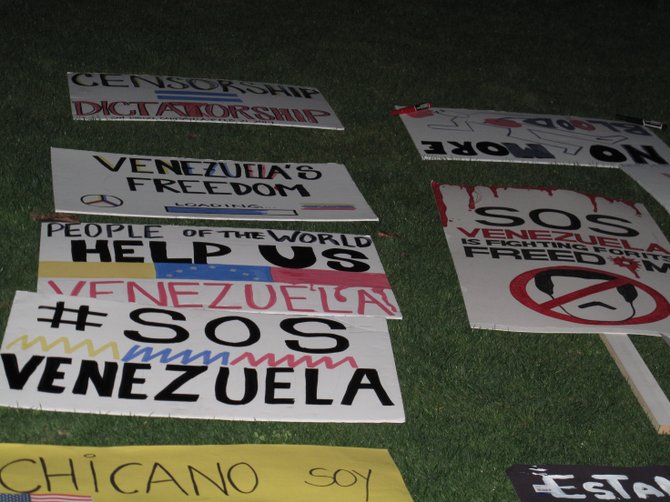 Words and signs from venezuelan demonstrators and sympathizers. 