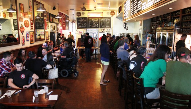 Toronado San Diego, seen here during an orderly, attendance-capped beer brunch, is often quite crowded