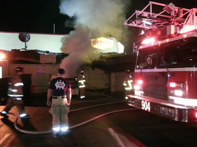 Firefighters act to extinguish blaze at PB Denny's