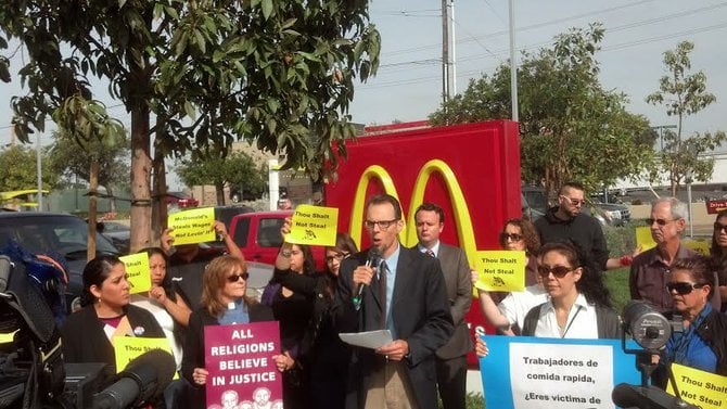 Dr. Peter Brownell of the Center on Policy Initiatives addresses the media