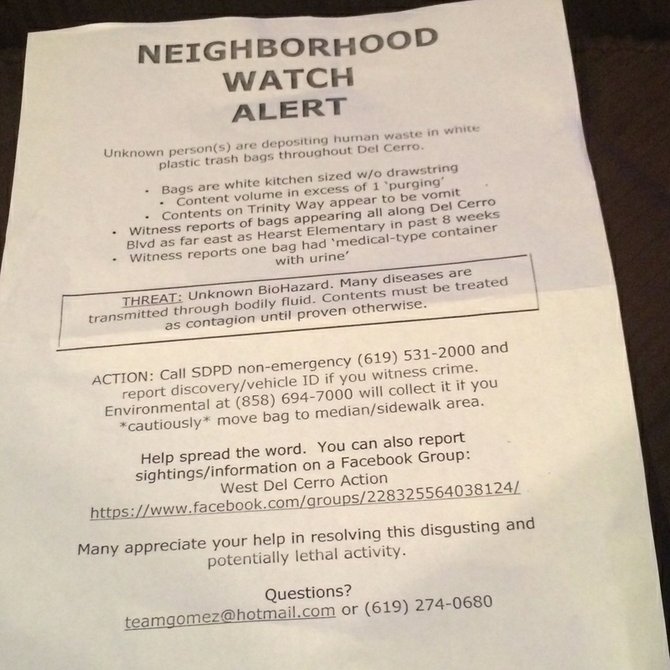 Neighborhood flyer being distributed.