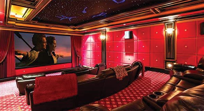 The “entertainers paradise” has a private movie theater with a classically themed lobby.