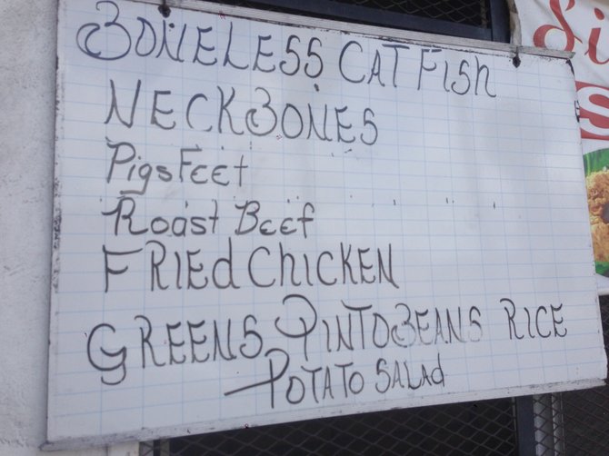 The menu posted out front changes daily. Don't your eyes just gravitate to the words "neck bones"?