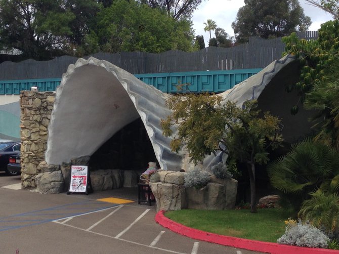 The grotto adds a little quirk, but the dog entrance is to the right.