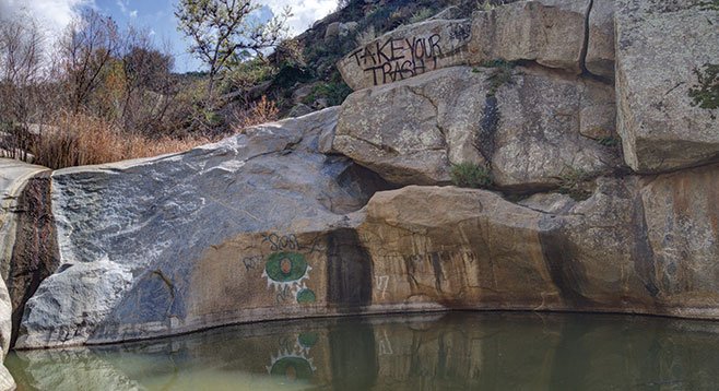 Though littered with trash and graffiti, Black Canyon’s waterfalls and pools are abundant with natural beauty.