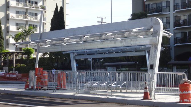 New and modernistic bus shelters are up for the MTS rapid transit line, but not yet in use. This is at the corner of University Avenue and Park Blvd.