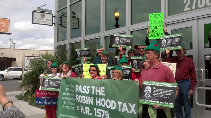 "Robin Hood Tax" advocates outside Susan Davis' office