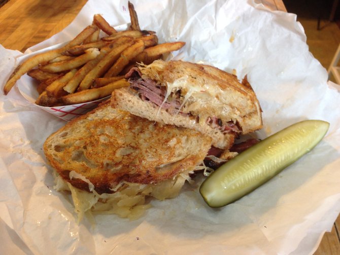 I'm pretty sure this sandwich is melting. Grilled Reuben. New York on Rye.