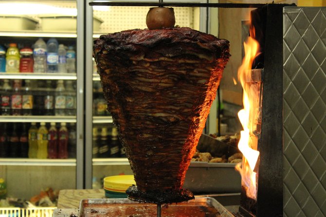 Los Albañiles' trompo is temporarily out of commission, but the plancha-prepared adobada maintains its savor. 
