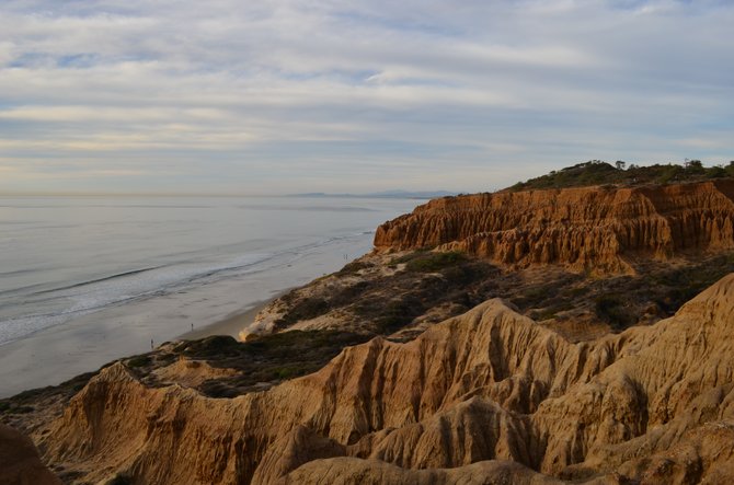 Torrey Pines State Reserve Badlands (Bay Point Rock Formation).  Looking north over Torrey Pines State Beach just before sunset.  December 13, 2013.  