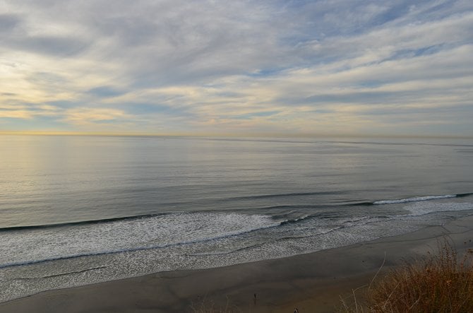 View of the sky and ocean of Torrey Pines State Beach (from Torrey Pines State Reserve) at sunset.  December 13, 2013.  