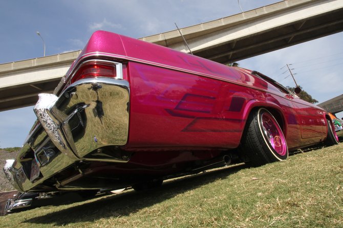 This is one of my photographs from my "Under the Bridge" set with the Klique SD car club. This was photographed during Chicano Park Day 2014 (April 19, 2014). Photography by Mike Madriaga