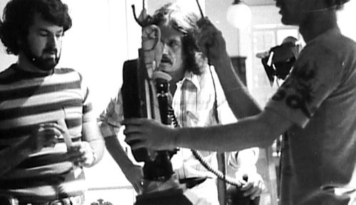 Dean Cundey (l) and John Carpenter (center) on the set of Halloween
