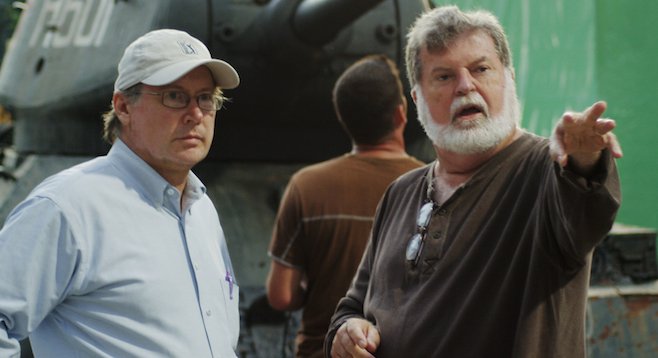 Director Mark Schmidt (l) and Dean Cundey on the set of Walking with the Enemy