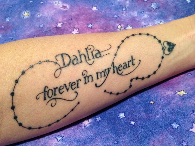 On January 8th of this year, I lost my beautiful black German Shepherd to cancer, she was only 6 years old. Her name was Dahlia, named after the gruesome, much publicized "Black Dahlia" murder case of 1947.

Her loss was, hands down, the worst heart break of my entire life.

I had this tattoo done to remind me of the unconditional love that she gave me. The kind of love that only animals can give us, the kind of love that only animal lovers can understand.

I am grateful to the amazingly talented Gemma Pariente (at Full Circle Tattoo in South Park) for her artistry. Thanks to Gemma, Dahlia will truly be "forever in" and always near "my heart".

My name is Patti Lamoureux. 
I'm 52 years young, live in Santee and I'm happily work free --right now!!