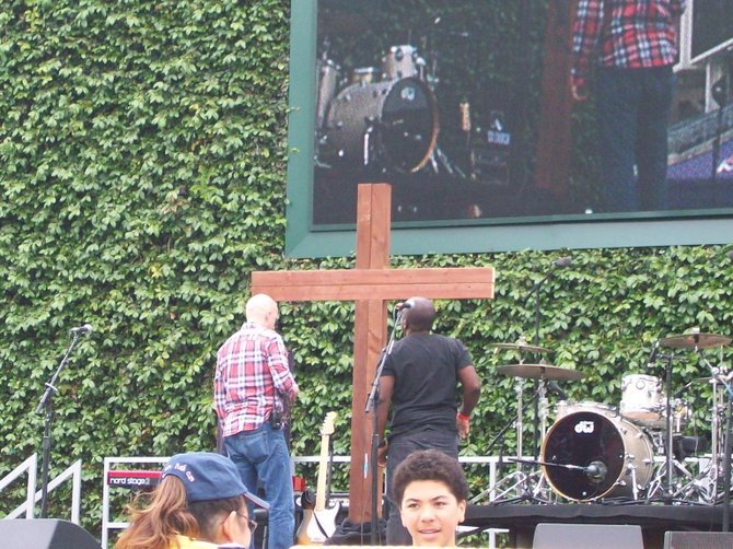workers prepare the stage for the Good Friday event.