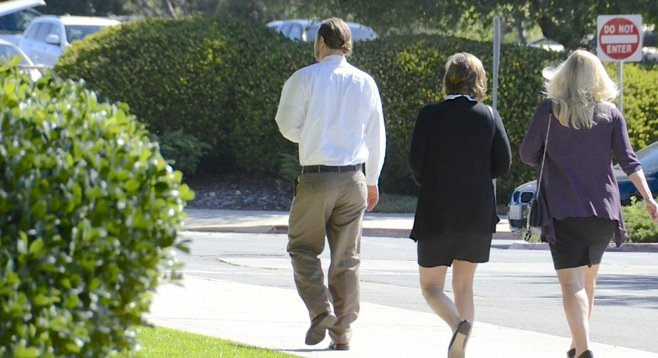 Tim Lambesis remains at liberty, walking away from the courthouse this morning. Sentencing delayed. Photo by Weatherston