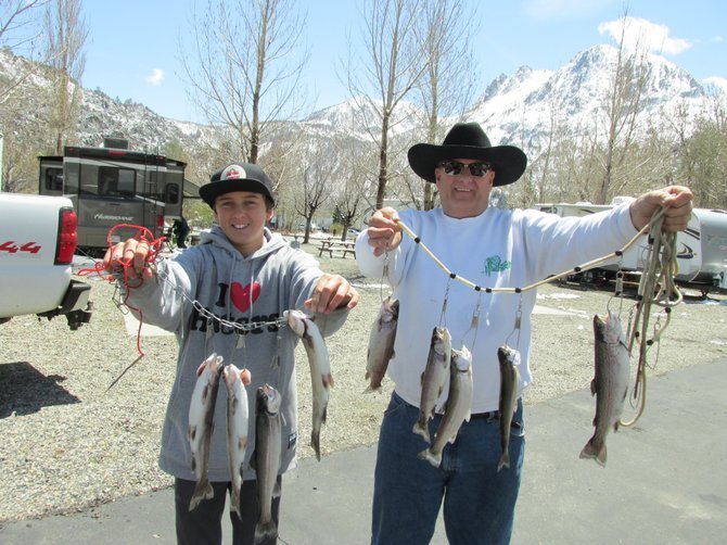 No monster trout, no worries: the author with his son Trevor, happy with their results. 