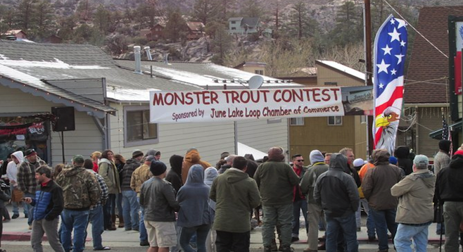 A crowd gathers in June Lake to see the largest trout in the annual Monster Trout Contest.