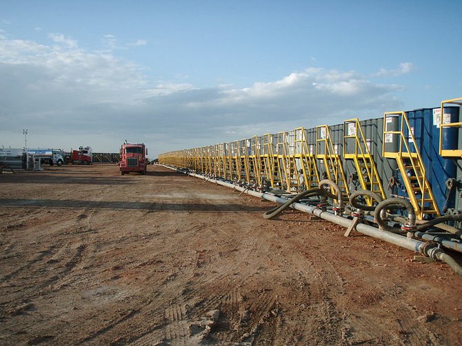 Water tanks being prepared for use in a fracking operation. Photo: Joshua Doubek via Wikimedia Commons