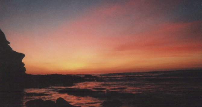 "Face in the Cliffs"  watching the sunset. taken at Sunset Cliffs Park, Ocean Beach; (near Garbage Beach)